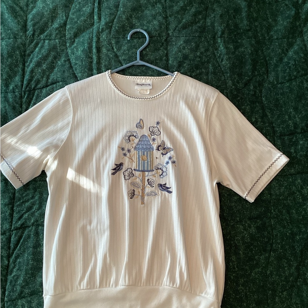 White top with birdcage design